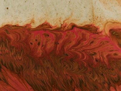 red, brown, and yellow abstract painting