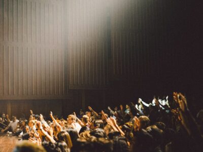 people raising their hands