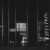 Nighttime reflections on building windows.