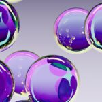 Abstract purple spheres with reflections on gray background