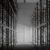 A dark room filled with lots of shelves